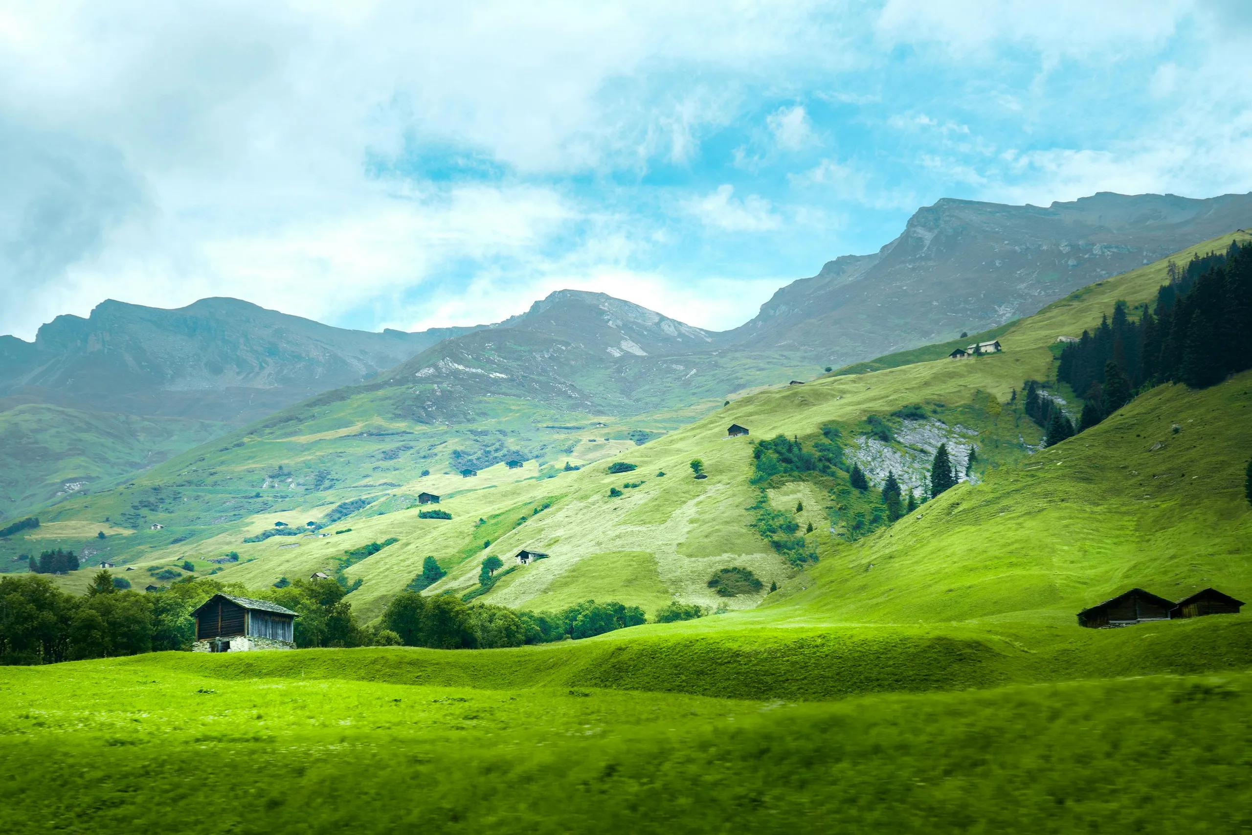 Green hills in countryside with pastoral landscape